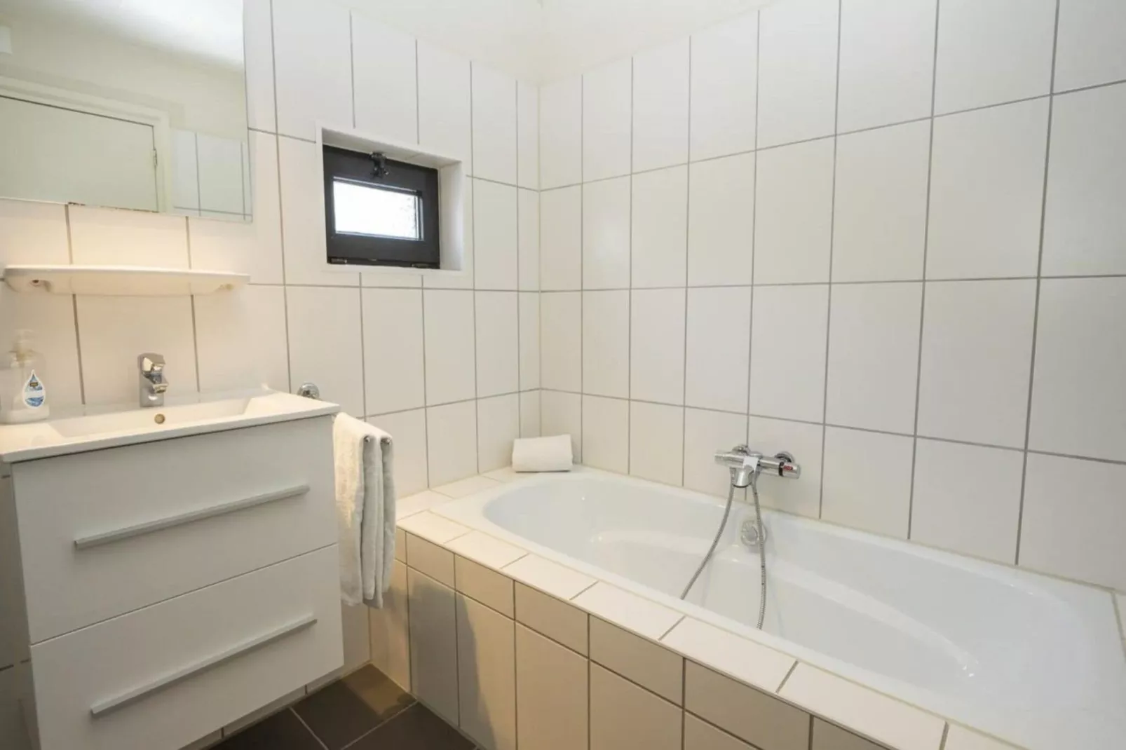 Strandhuys Schelp-Badezimmer