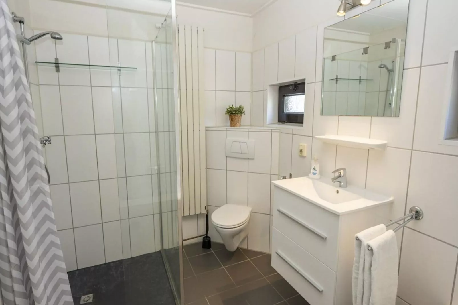 Strandhuys Schelp-Badezimmer