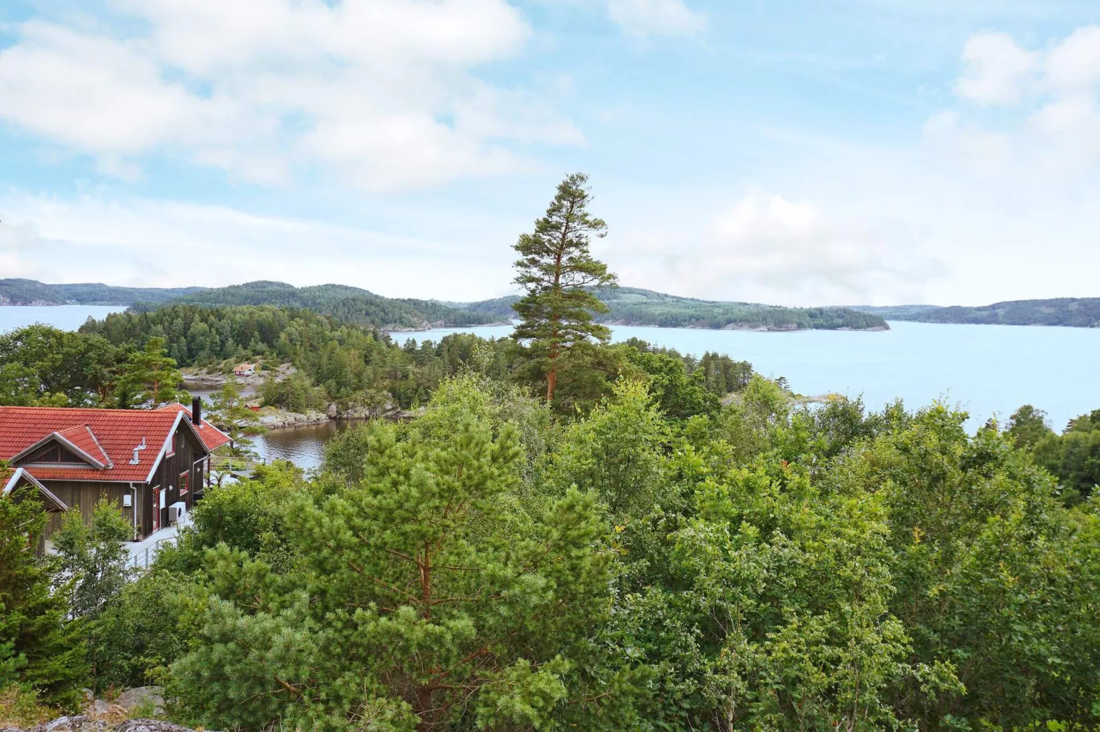 5 person holiday home in MUNKEDAL-Water view