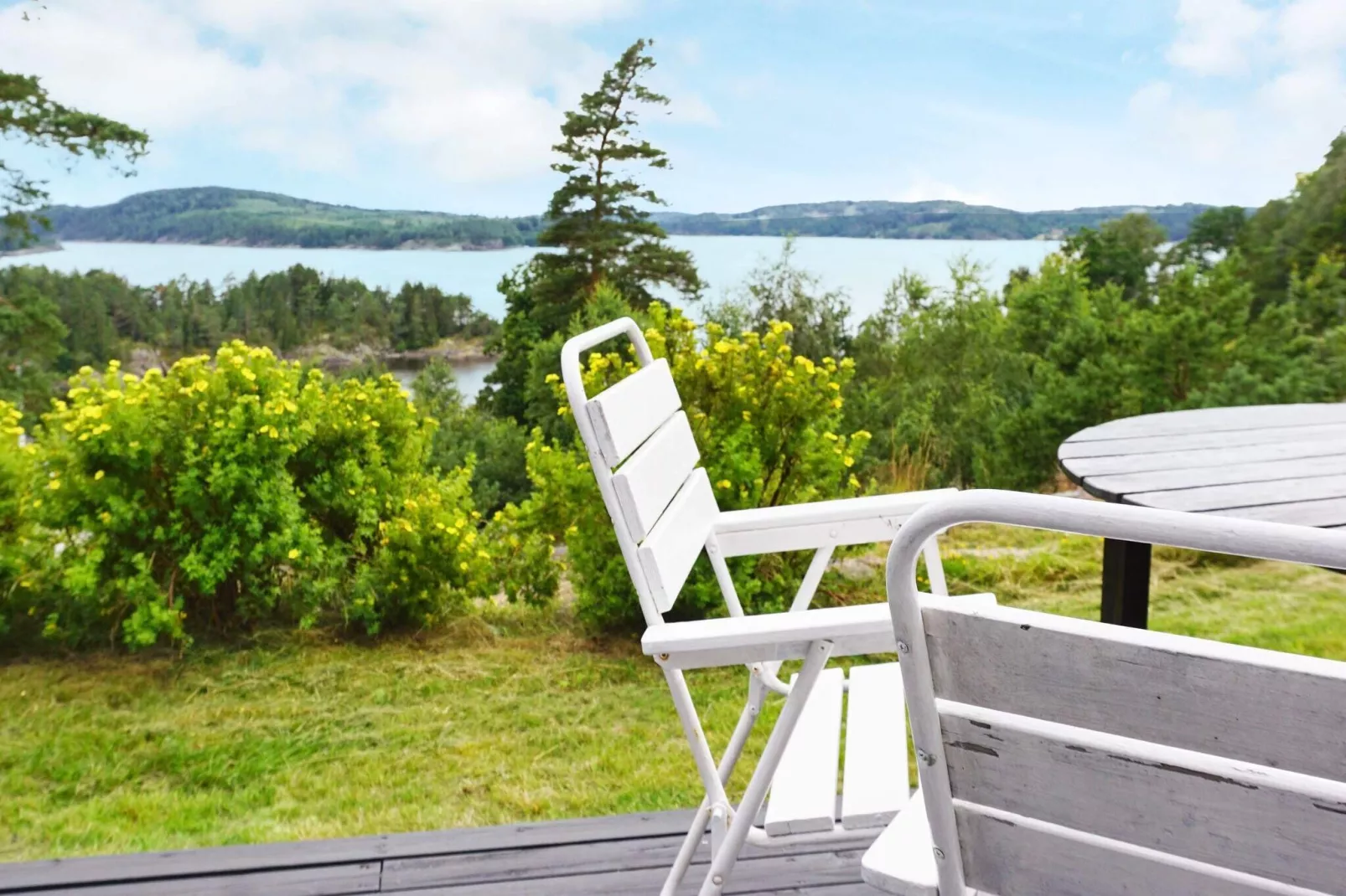 5 person holiday home in MUNKEDAL-Water view