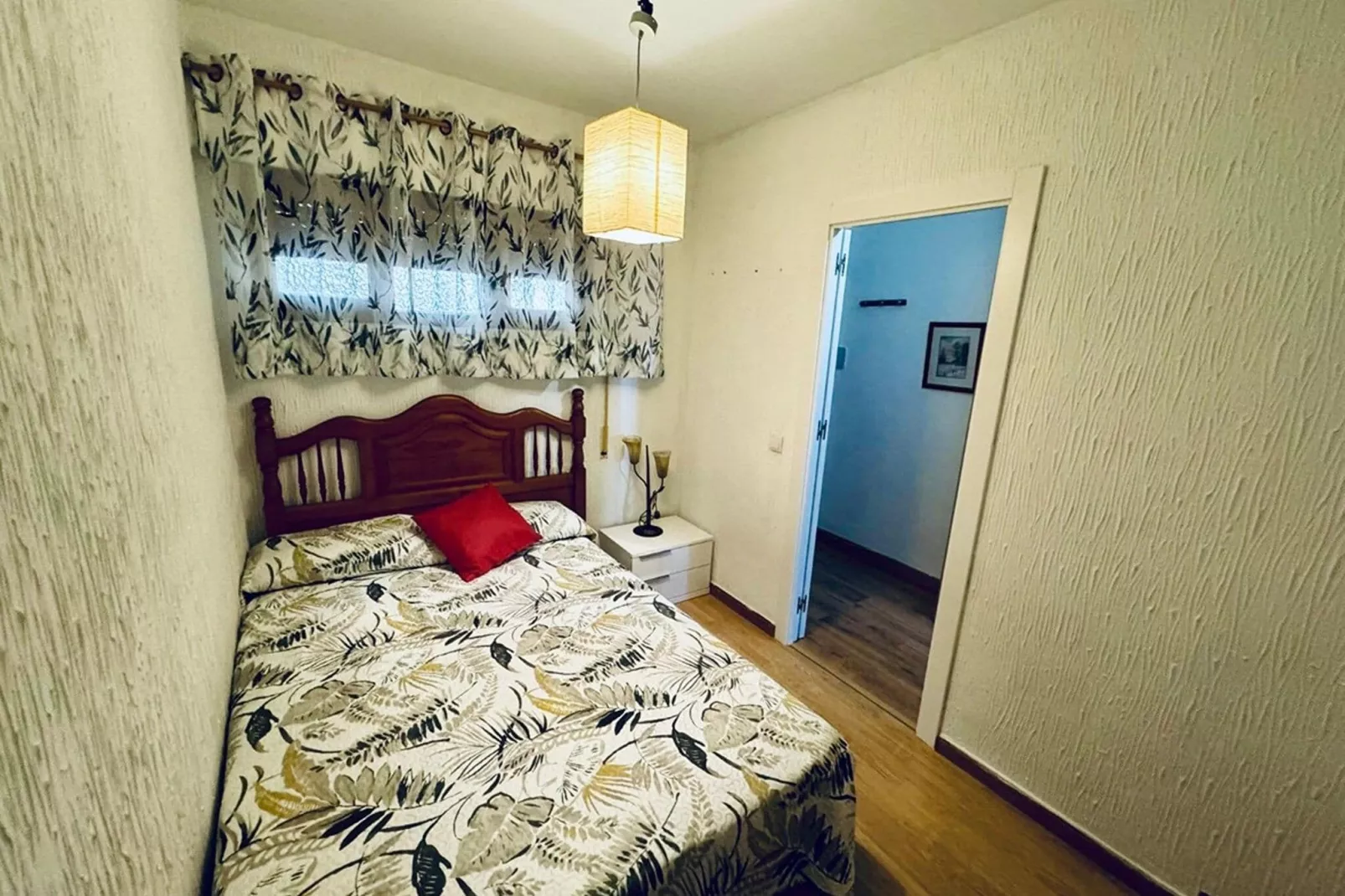 Apartamento Reina Sofía Primera linea de playa-Bedroom