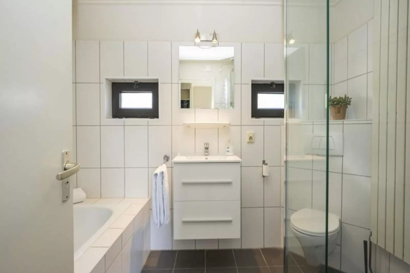 Strandhuys Schelp-Badezimmer