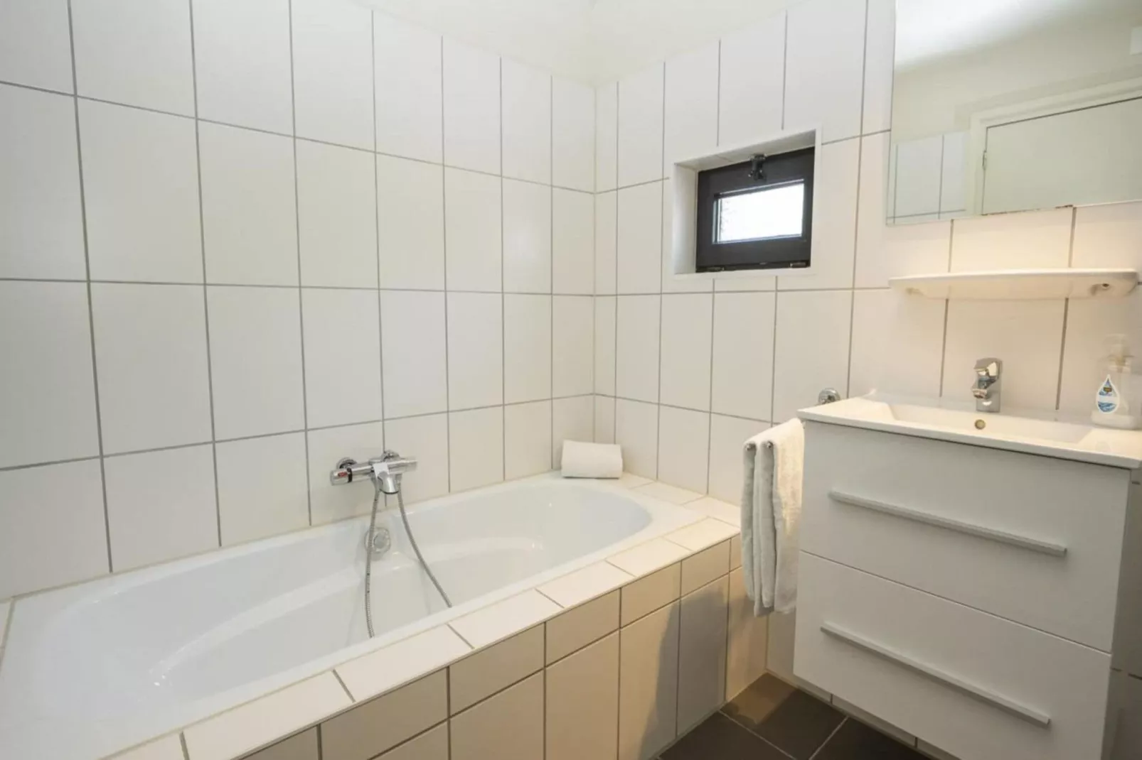 Strandhuys Schelp-Badezimmer