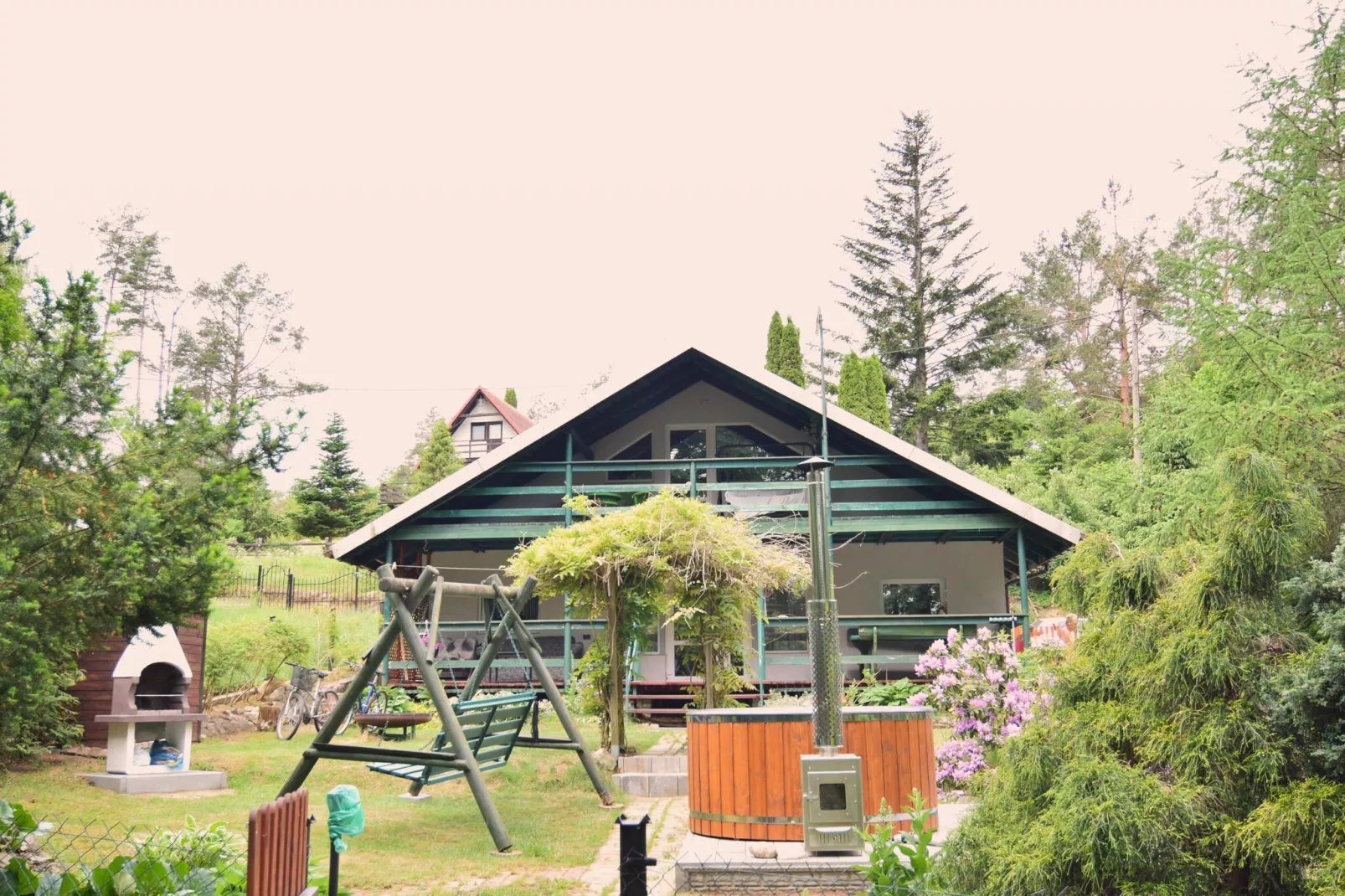 Holiday Home with whirlpool at the lake in Zakowo-Außenbereich Sommer