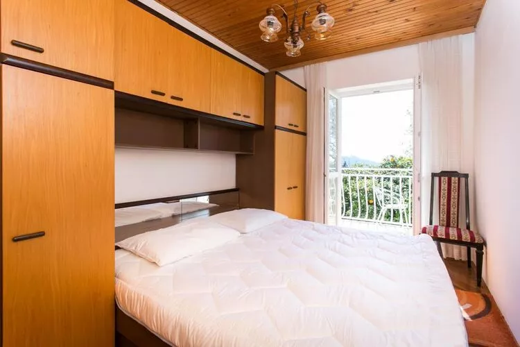 Apartments Anka - One-Bedroom Apartment with Balcony and Sea View-Schlafzimmer