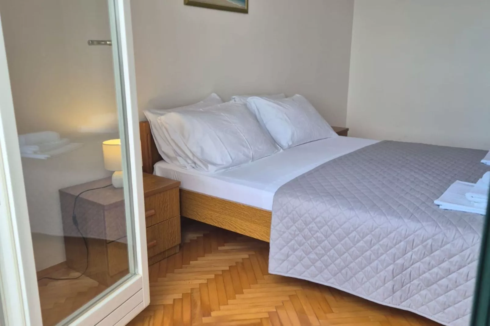 Apartment Mia - Two-Bedroom Apartment with Balcony and Sea View-Bedroom
