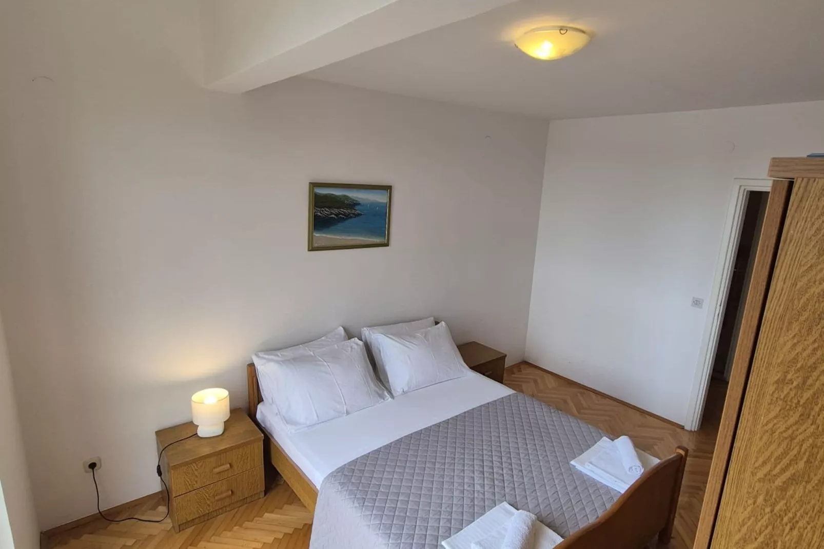 Apartment Mia - Two-Bedroom Apartment with Balcony and Sea View-Bedroom