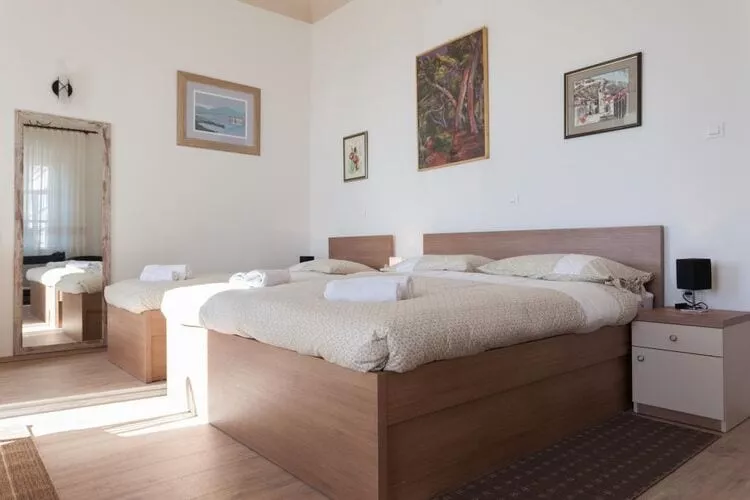 Villa Iveta - Two-Bedroom Apartment with Terrace and Sea View (Nikša)-Bedroom