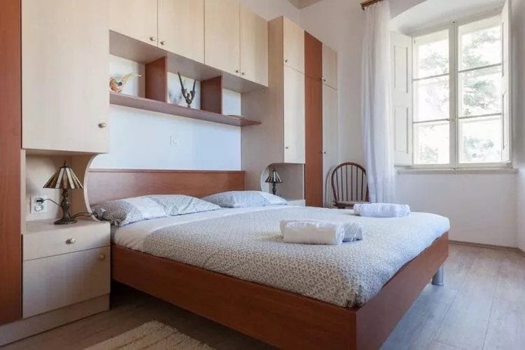 Villa Iveta - Two-Bedroom Apartment with Terrace and Sea View (Nikša)-Bedroom