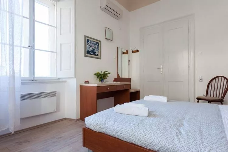 Villa Iveta - Two-Bedroom Apartment with Terrace and Sea View (Nikša)-Bedroom