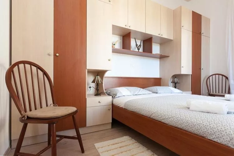Villa Iveta - Two-Bedroom Apartment with Terrace and Sea View (Nikša)-Bedroom