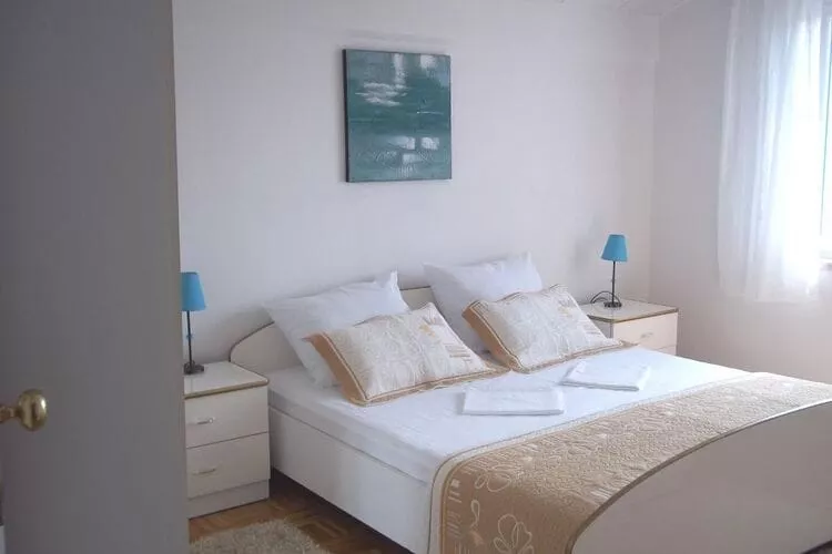 Apartment Sunshine - Two Bedroom Apartment with Sea View-Bedroom