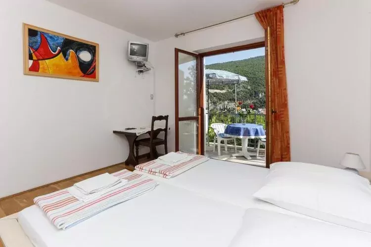 Villa Celenca - Double Room with Balcony and Sea View-Schlafzimmer