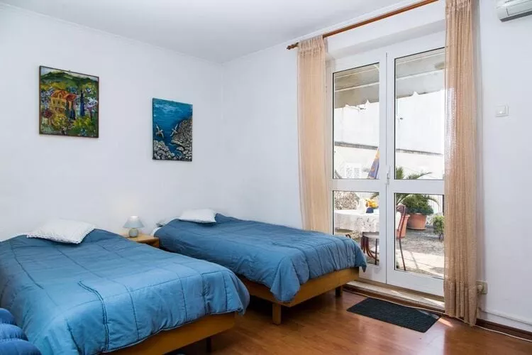 Plavi Zal Apartment - One Bedroom Apartment with Two Terraces-Schlafzimmer
