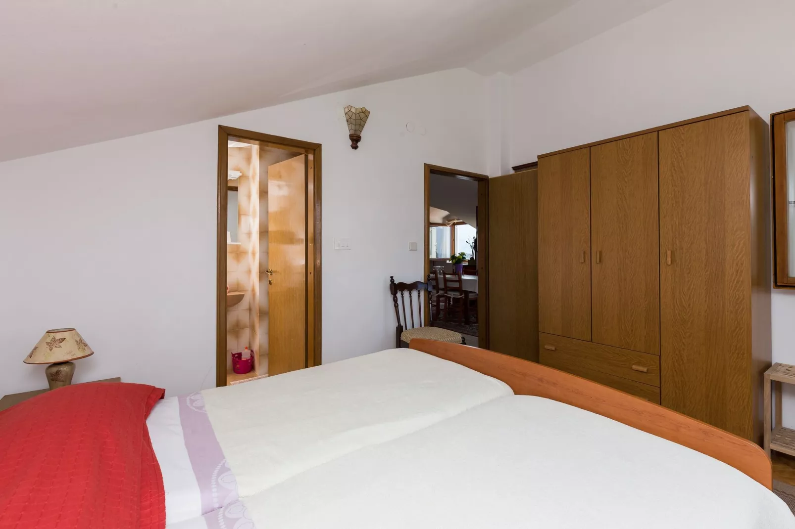 Apartments Kisic - Two-Bedroom Apartment with Balcony and Sea View(potkrovlje)-Schlafzimmer