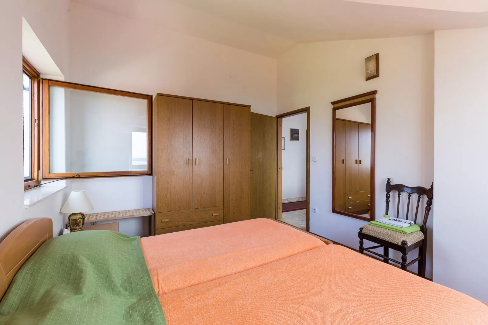 Apartments Kisic - Two-Bedroom Apartment with Balcony and Sea View(potkrovlje)-Schlafzimmer