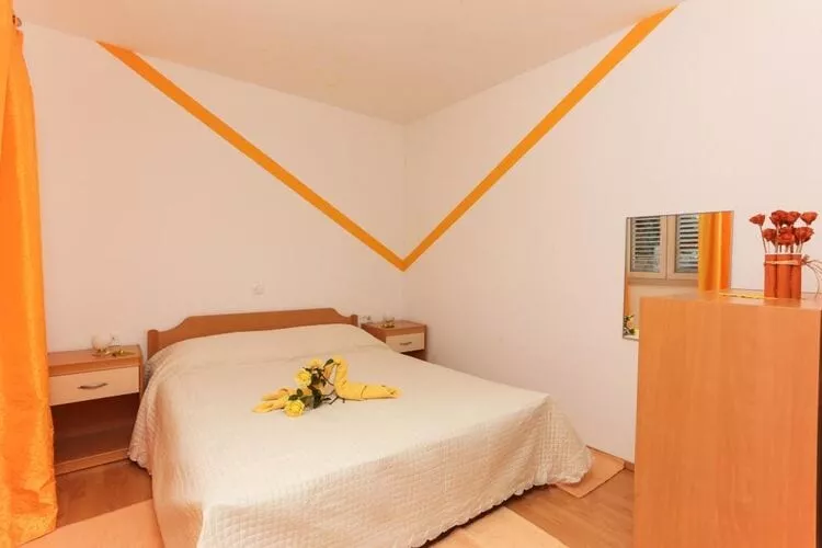 Apartments Pojko - One-Bedroom Apartment with Terrace (Yellow)-Bedroom
