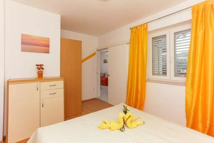 Apartments Pojko - One-Bedroom Apartment with Terrace (Yellow)-Bedroom