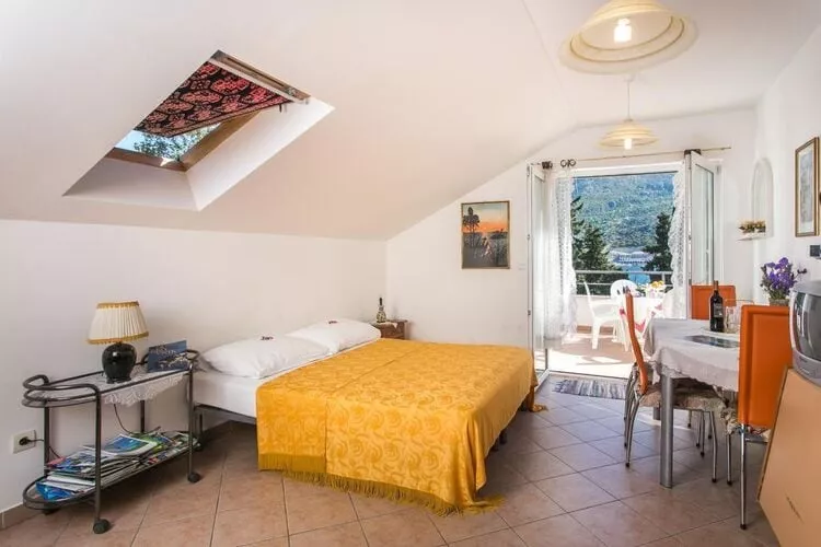 Apartments Tramonto - One Bedroom Apartment with Balcony and Sea View-Living room