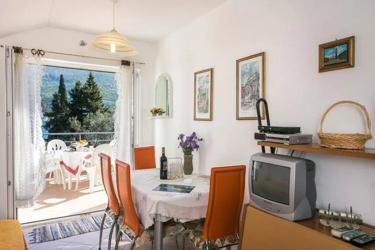 Apartments Tramonto - One Bedroom Apartment with Balcony and Sea View-Living room