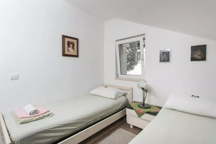 Apartments Tramonto - One Bedroom Apartment with Balcony and Sea View-Bedroom
