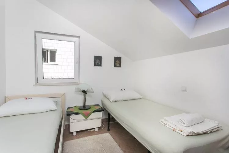 Apartments Tramonto - One Bedroom Apartment with Balcony and Sea View-Bedroom