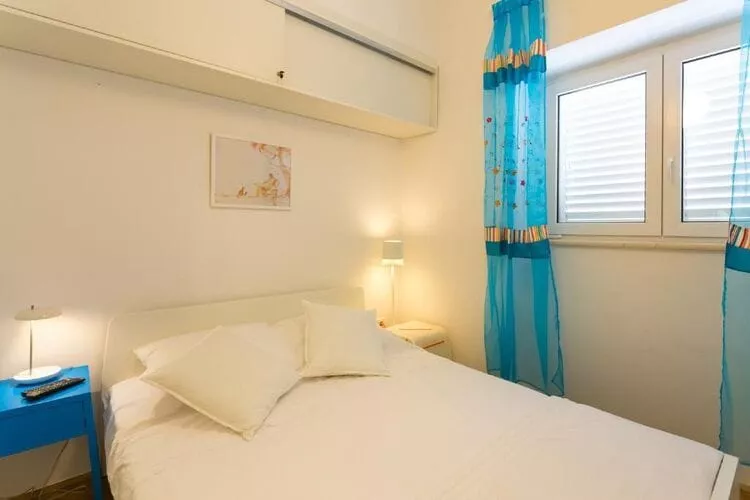 Apartment Natasha - One-Bedroom Apartment with Sea View-Bedroom
