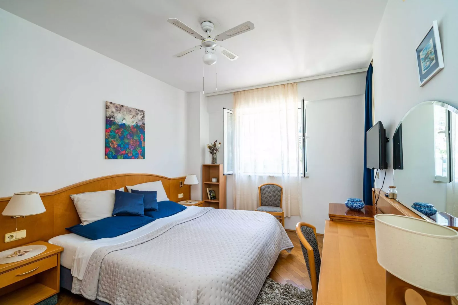 Down Town Apartments - One Bedroom Apartment with Balcony-Bedroom