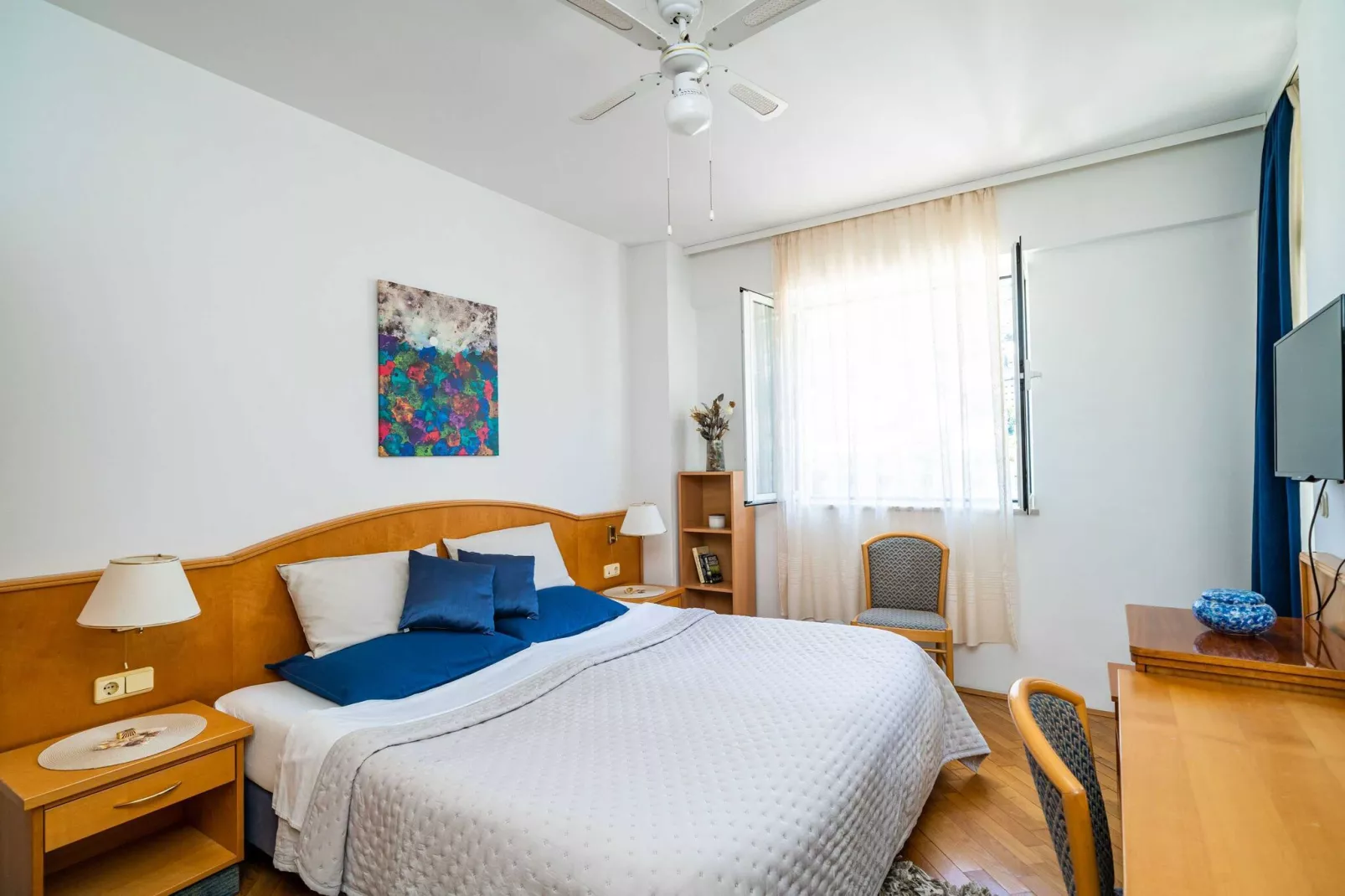 Down Town Apartments - One Bedroom Apartment with Balcony-Bedroom