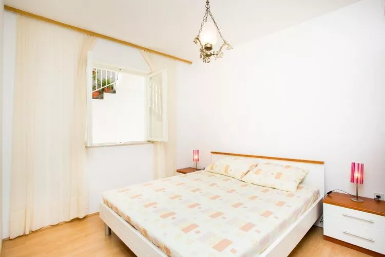 Apartment Debos - One-Bedroom Apartment with Balcony and Sea View-Bedroom