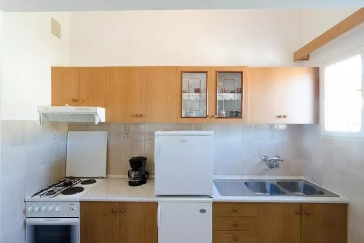 Apartments Kuzma - One-Bedroom Apartment with Balcony and Sea View-Kitchen