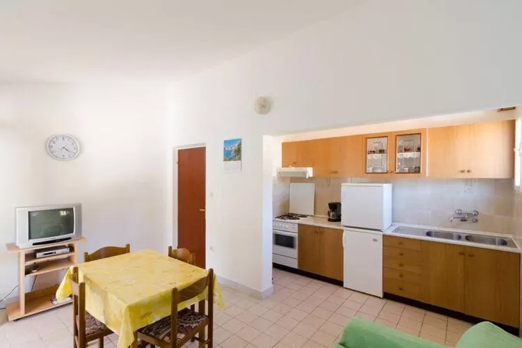 Apartments Kuzma - One-Bedroom Apartment with Balcony and Sea View-Kitchen