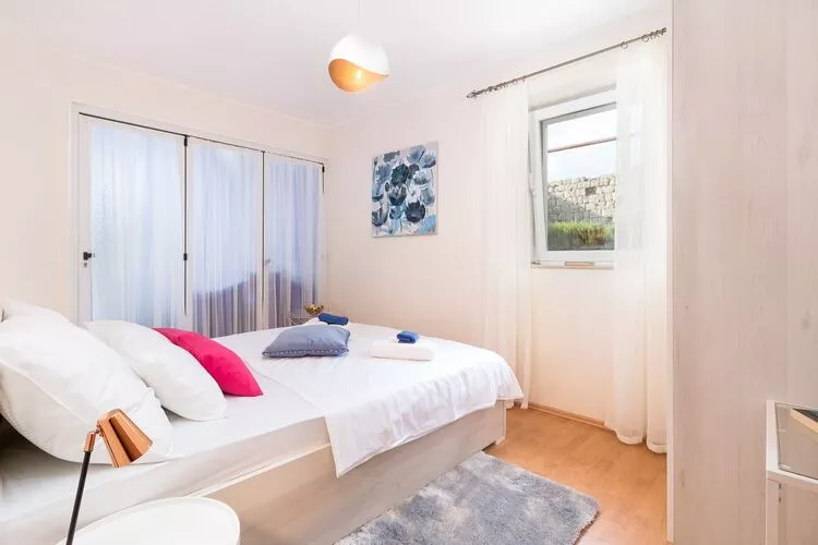 Apartments Lotea - Two-Bedroom Apartment with Terrace and Sea View-Bedroom