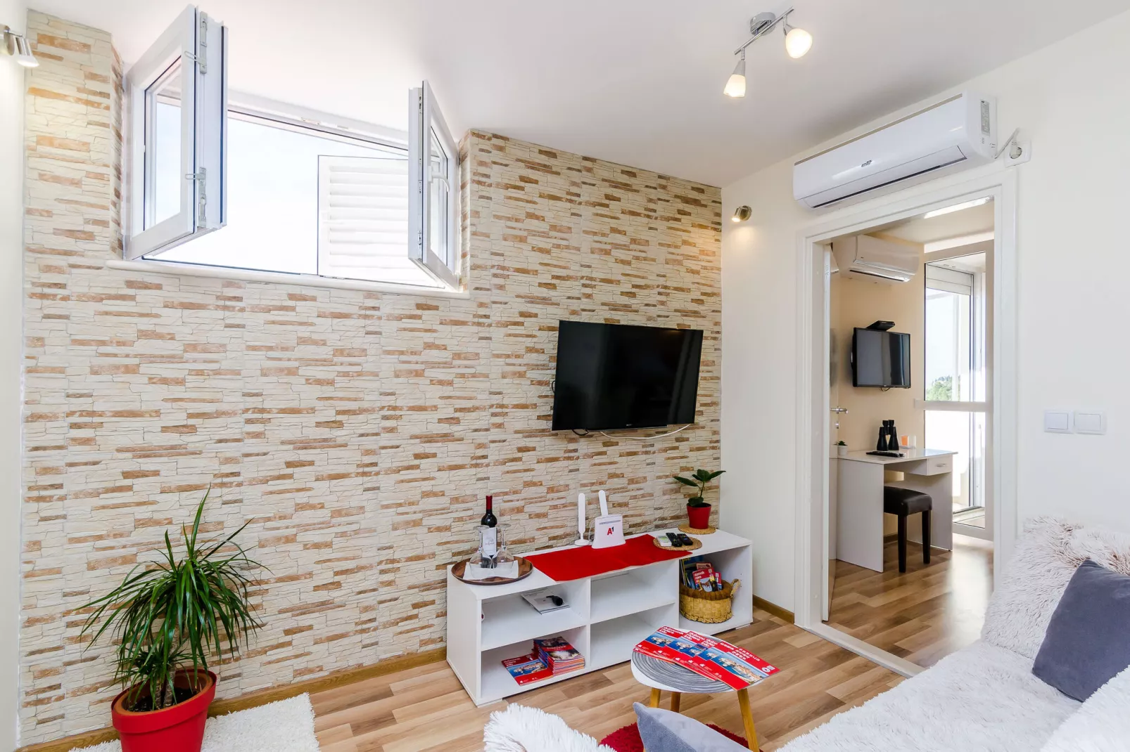 Apartment Vedrana- One-Bedroom Apartment with Balcony and Sea View-Living room