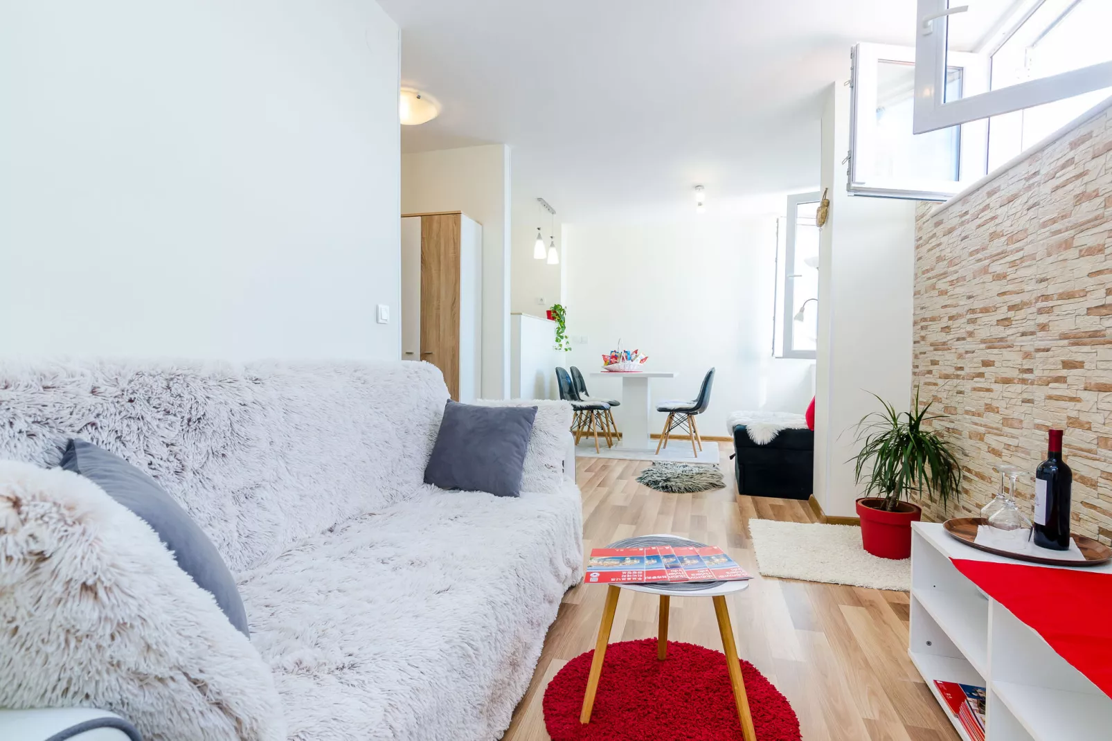 Apartment Vedrana- One-Bedroom Apartment with Balcony and Sea View-Living room