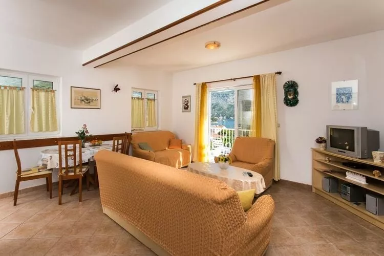 Apartments Marina - One Bedroom Apartment with Balcony and Sea View-Living room