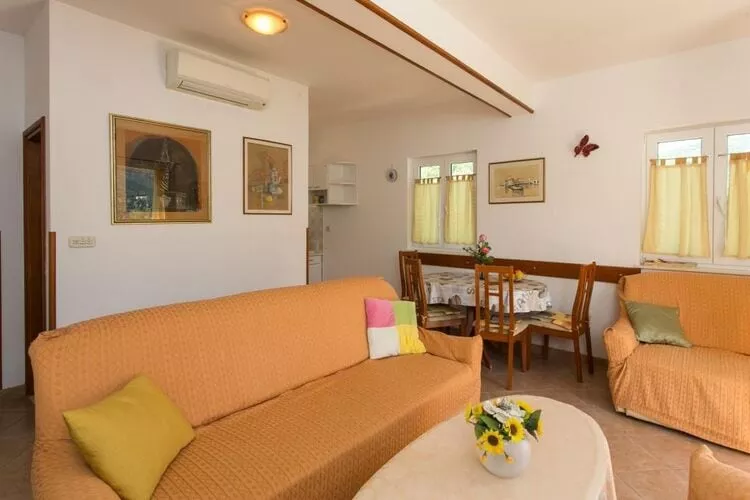 Apartments Marina - One Bedroom Apartment with Balcony and Sea View-Living room