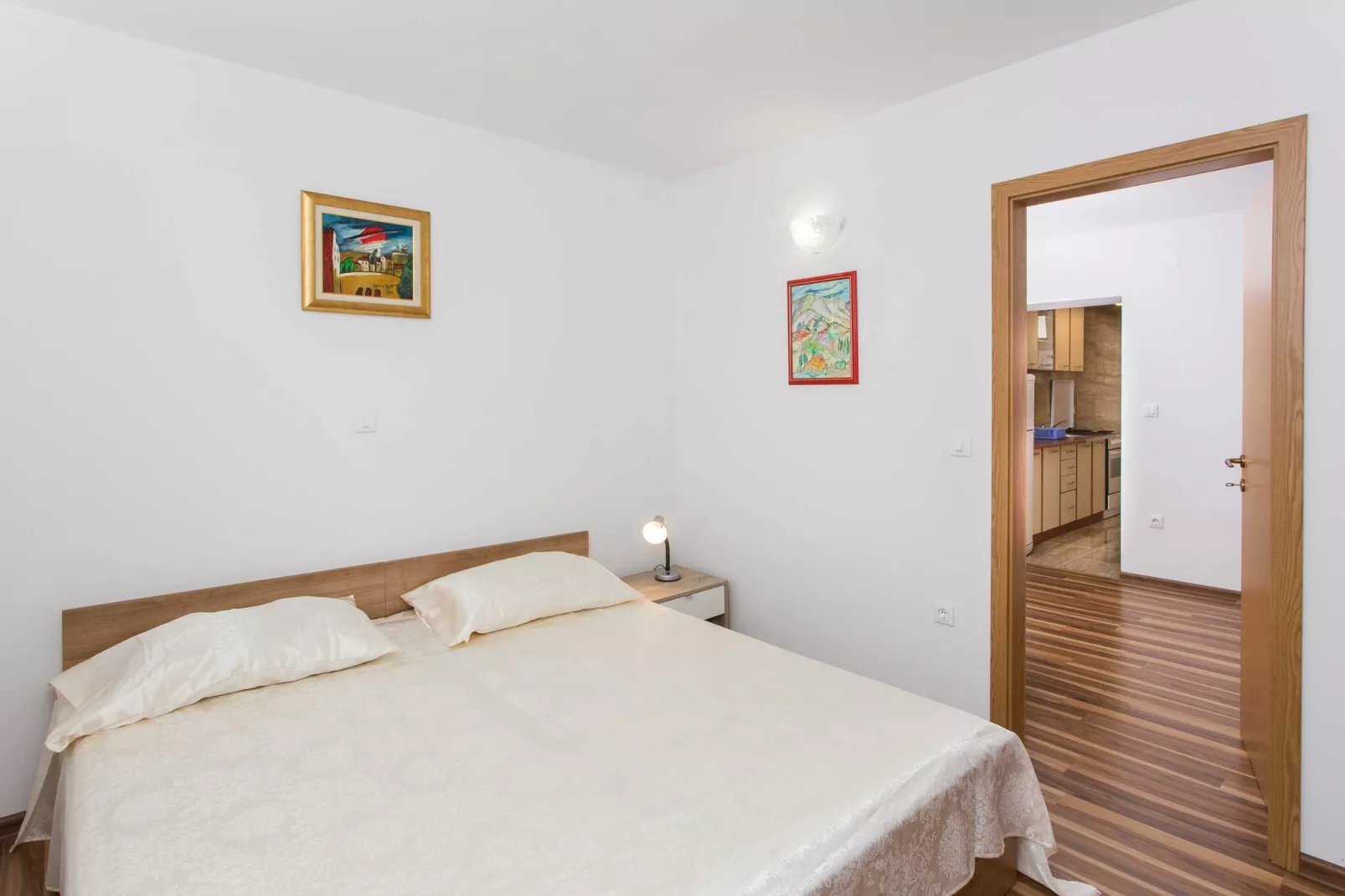 Apartments Djurkovic - One-Bedroom Apartment with Shared Terrace and Sea View-Schlafzimmer