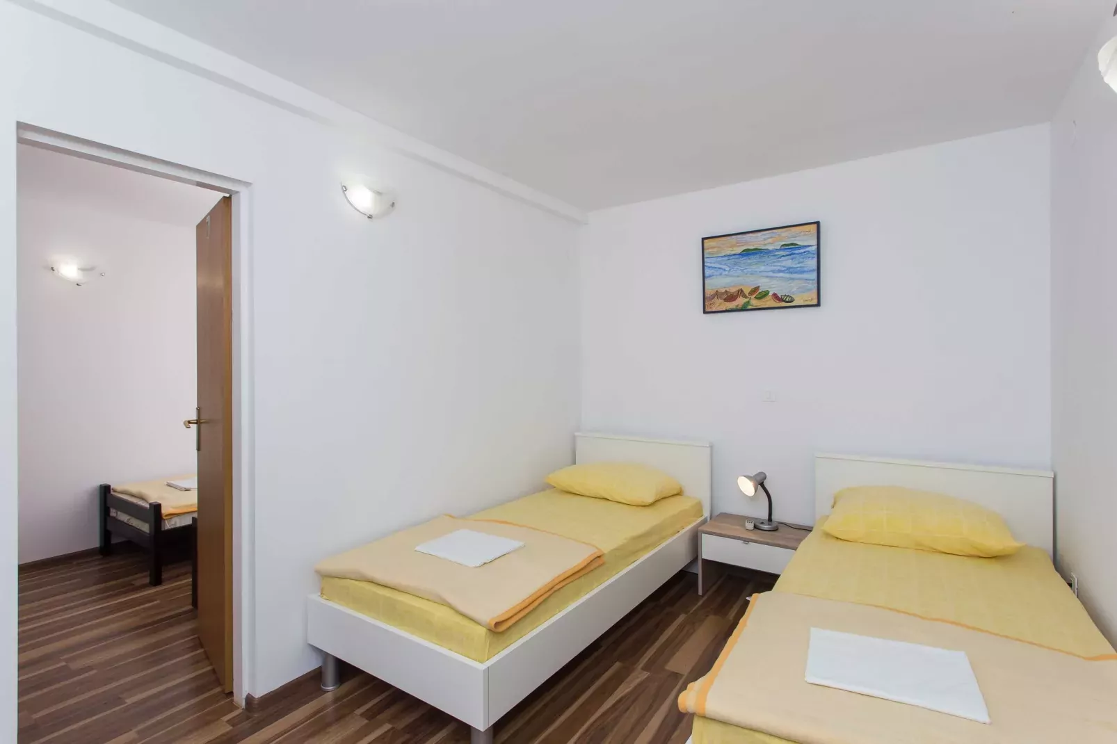 Apartments Djurkovic - Two-Bedroom Apartment with Shared Terrace and Sea View-Bedroom