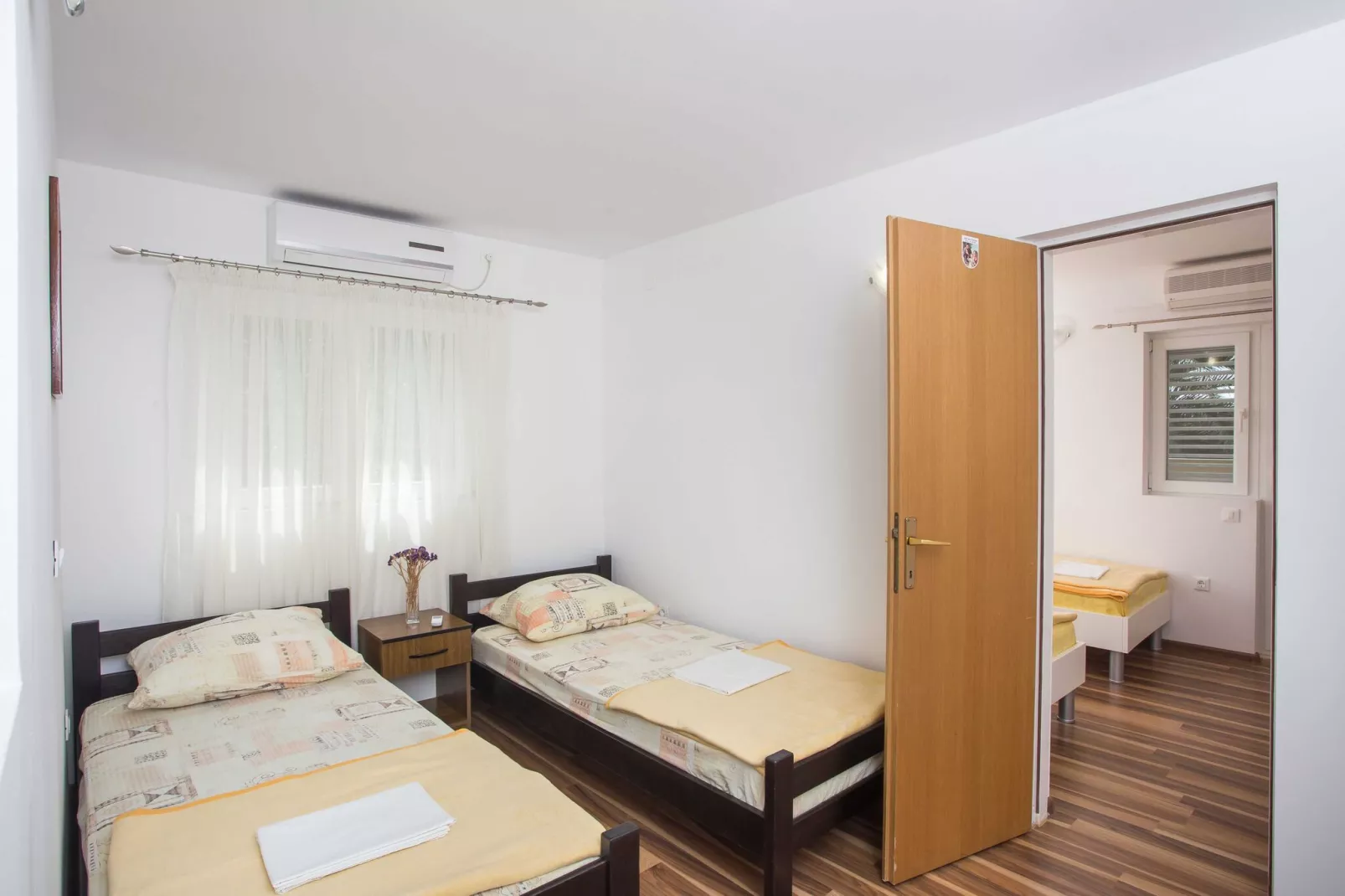 Apartments Djurkovic - Two-Bedroom Apartment with Shared Terrace and Sea View-Bedroom