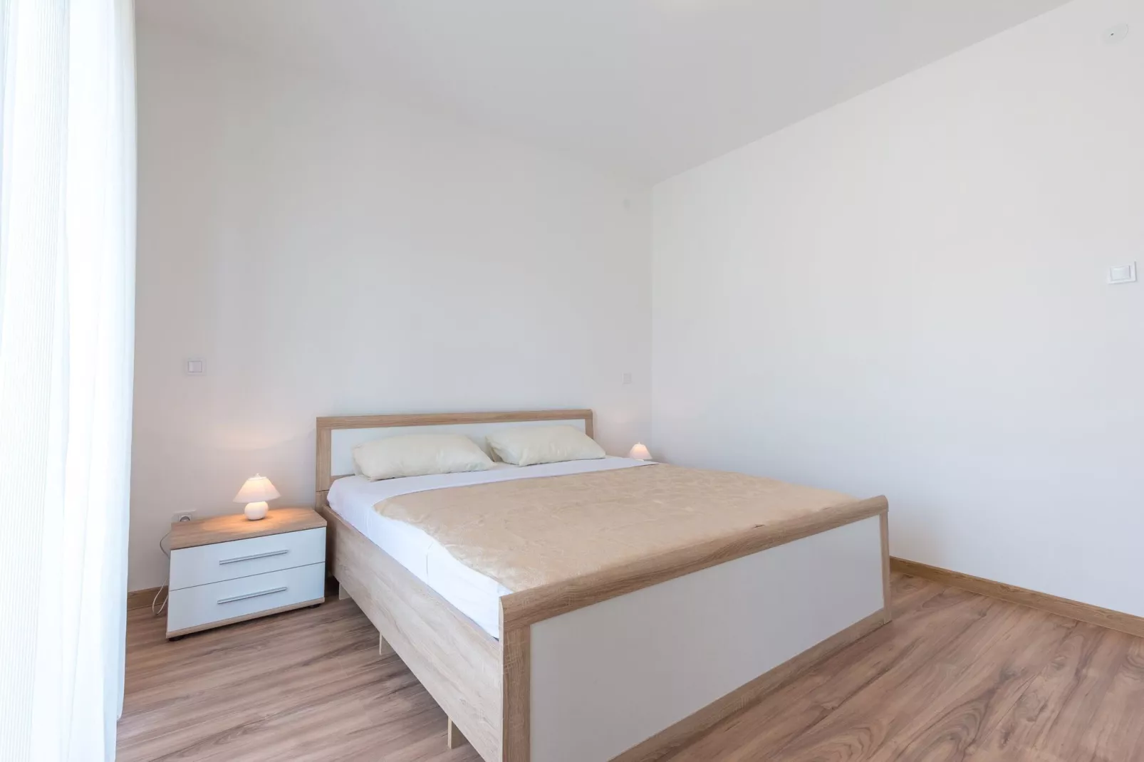 Apartments Lucija - Two Bedroom Apartment with Balcony and Sea View-Bedroom