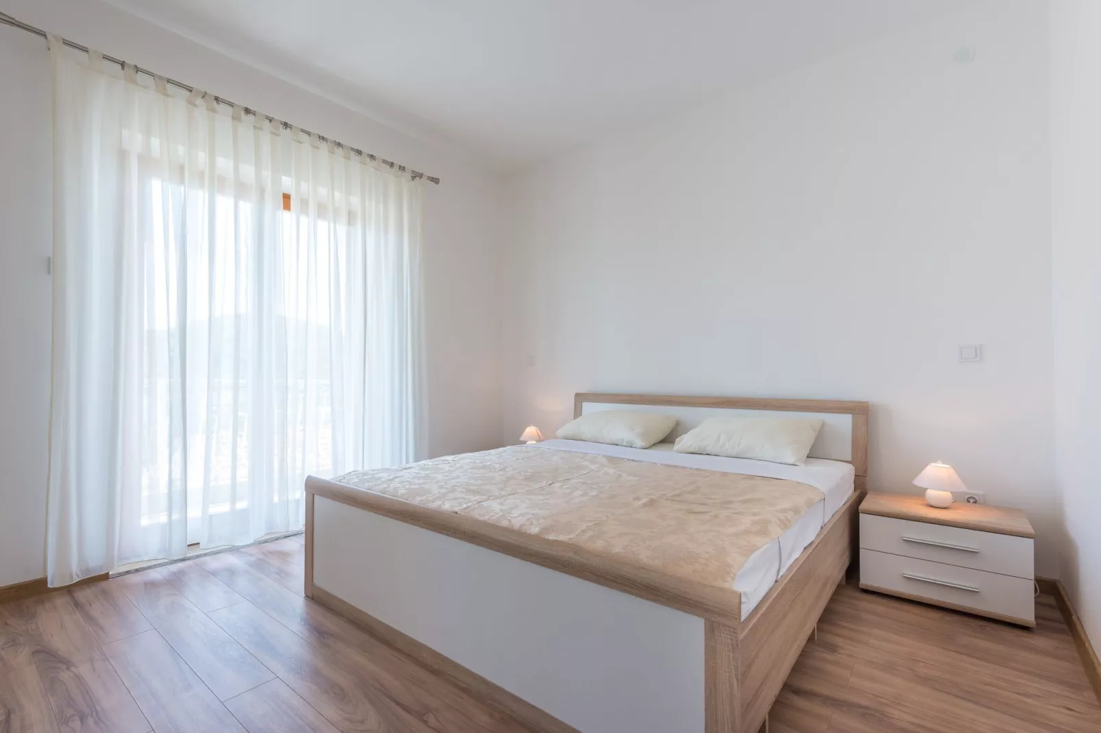 Apartments Lucija - Two Bedroom Apartment with Balcony and Sea View-Bedroom
