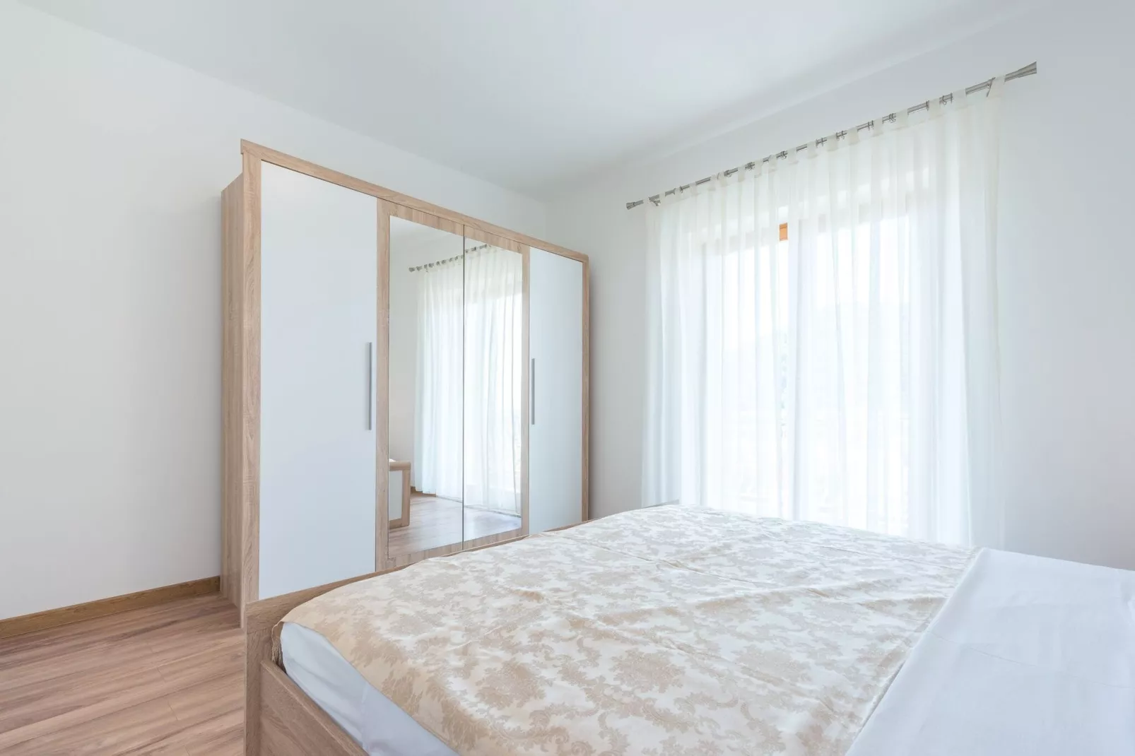 Apartments Lucija - Two Bedroom Apartment with Balcony and Sea View-Bedroom