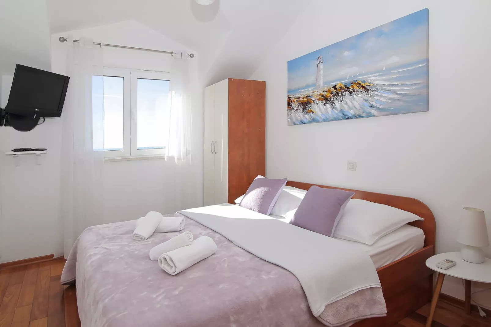 Apartments Isabora - Comfort Three-Bedroom Apartment with Balcony and Sea View (Second Floor)-Bedroom
