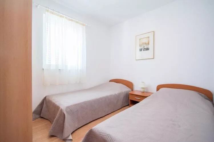 Apartments Batinic - Two Bedroom Apartment with Terrace and Sea View (ST)-Bedroom