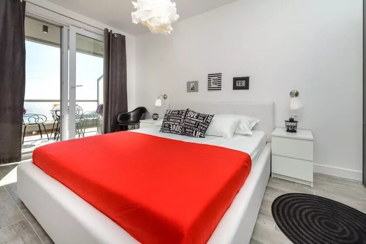Apartments Villa Capitano - Two Bedroom Apartment with Balcony and Sea View (CRNI)-Bedroom