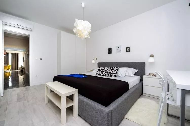 Apartments Villa Capitano - Two Bedroom Apartment with Balcony and Sea View (ŽUTI)-Bedroom