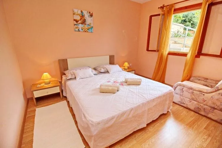 Apartments Bačić - One Bedroom Apartment with Terrace and Sea View (A2+1)-Chambre