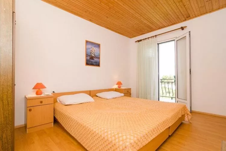 Apartments Sutvid- One Bedroom Apartment with Loggia and Sea View-Bedroom