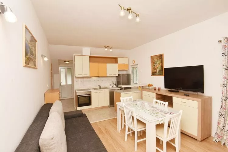 Green Hills Apartment - One Bedroom Apartment with Balcony and Sea View-Living room